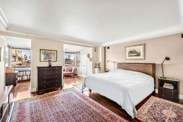 35 Sutton Pl Unit 3C, New York City, NY 10022 - bedroom with wood finished floors, ornamental molding, and baseboards