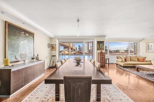 35 Sutton Pl Unit 3C, New York City, NY 10022 - dining area with wood finished floors and ornamental molding