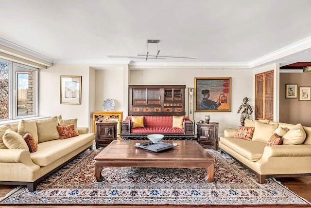 living room featuring hardwood / wood-style floors and crown molding