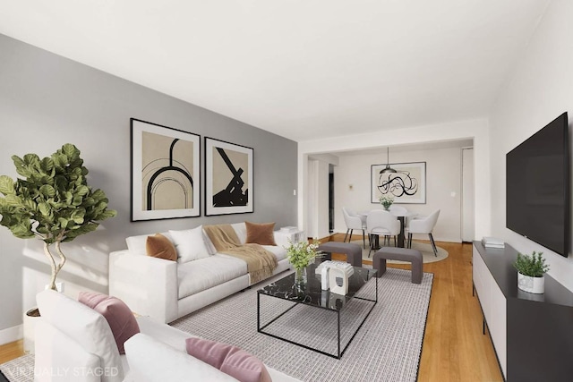 living room with light hardwood / wood-style flooring