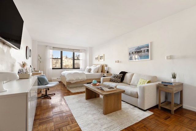 bedroom featuring baseboards