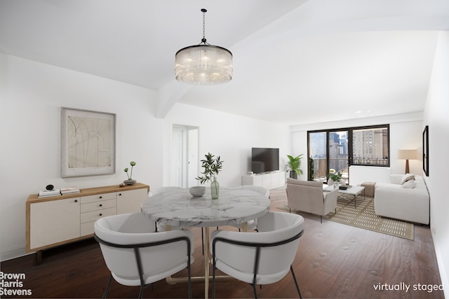 dining space with a chandelier, dark wood-type flooring, and beamed ceiling