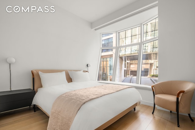 bedroom with light wood-style flooring