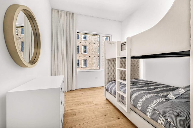 bedroom featuring light wood-style flooring