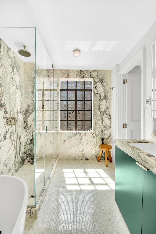 322 E 57th St Unit 12A, New York City, NY 10022 - full bath with a soaking tub, a sink, and a marble finish shower