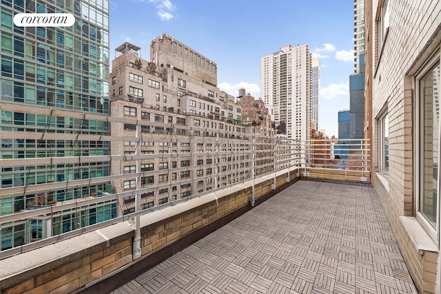 balcony featuring a city view