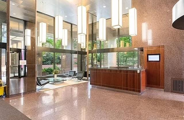 30 W 61st St Unit 21B, New York City, NY 10023 - reception area with a towering ceiling