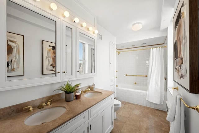 full bathroom featuring vanity, toilet, and shower / bath combo