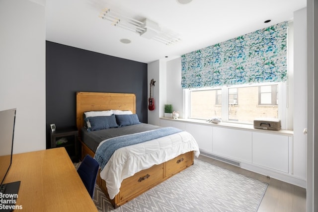 bedroom featuring light hardwood / wood-style floors