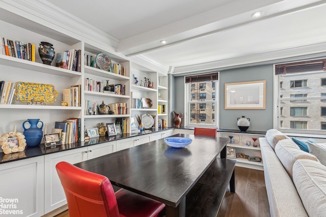 dining space with dark wood-style flooring and beamed ceiling