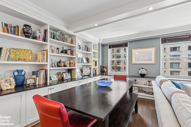 dining space with dark wood-style floors and beamed ceiling