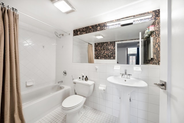 48 Whipple St Unit 3B, New York City, NY 11206 - full bath featuring tile walls, shower / tub combo, tile patterned floors, and toilet
