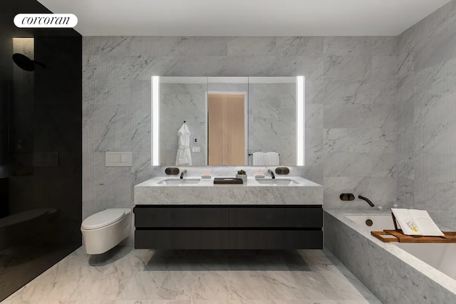 bathroom featuring toilet, a tub, tile walls, and vanity