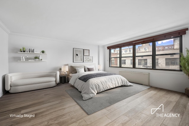 bedroom featuring light wood-type flooring