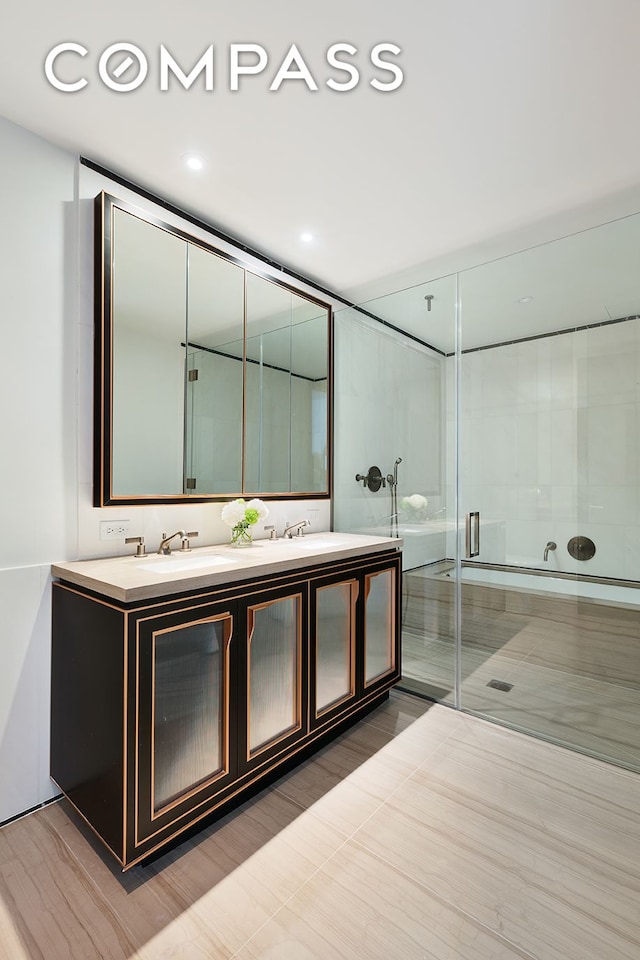 51 Jay St Unit 5D, New York City, NY 11201 - full bath with double vanity, a shower stall, and recessed lighting