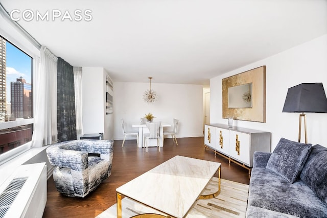 living room with dark wood-type flooring