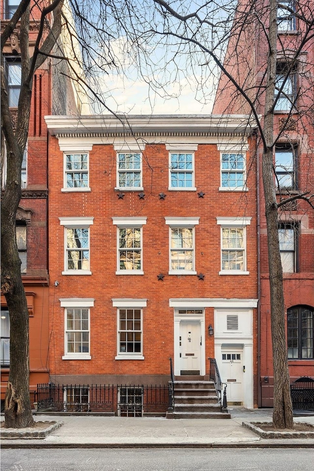46 Perry St, New York City, NY 10014 - view of property featuring entry steps