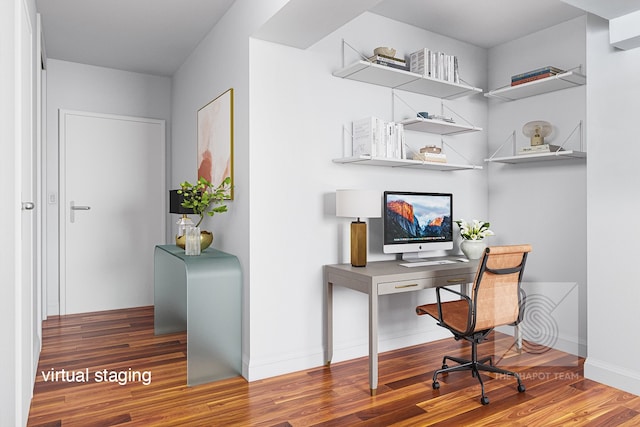 office area featuring baseboards and wood finished floors