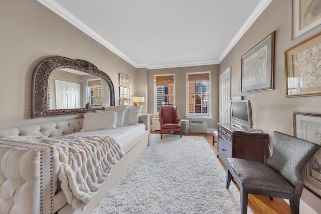 14 Sutton Pl S Unit 13F, New York City, NY 10022 - living room featuring ornamental molding, a wall unit AC, and light wood-style floors