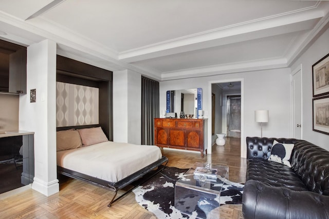 bedroom with baseboards and ornamental molding
