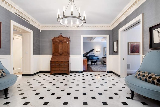 interior space with ornamental molding and a notable chandelier