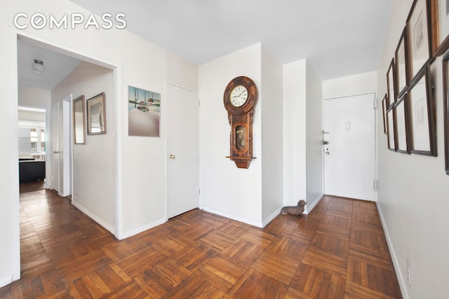 311 E 71st St Unit 8G, New York City, NY 10021 - hall featuring baseboards