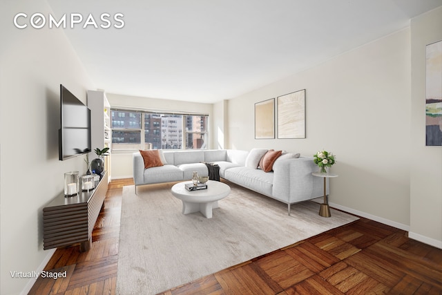 311 E 71st St Unit 8G, New York City, NY 10021 - living room with baseboards