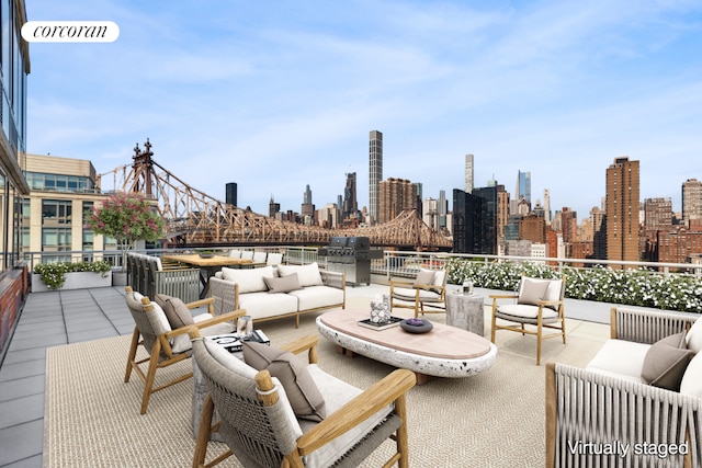 view of patio / terrace with an outdoor living space and a grill