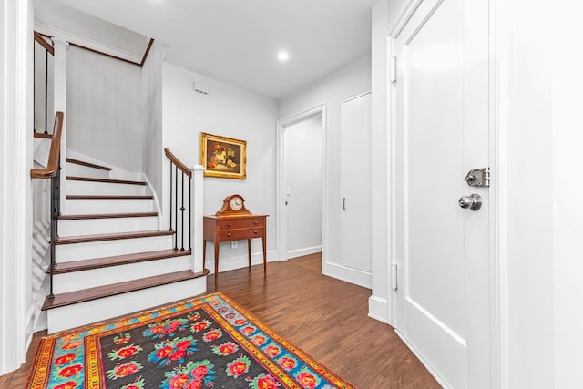 24 W 69th St Unit 9B, New York City, NY 10023 - entrance foyer featuring baseboards, recessed lighting, stairs, and wood finished floors