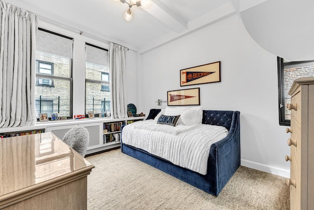 24 W 69th St Unit 9B, New York City, NY 10023 - bedroom with baseboards and beamed ceiling