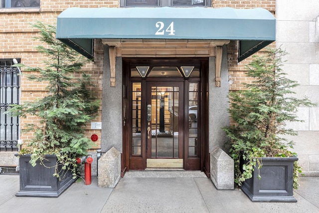 24 W 69th St Unit 9B, New York City, NY 10023 - entrance to property featuring brick siding