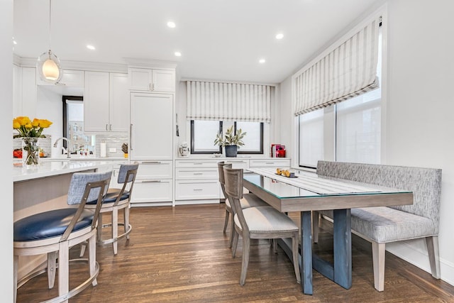 24 W 69th St Unit 9B, New York City, NY 10023 - dining room featuring recessed lighting and dark wood finished floors
