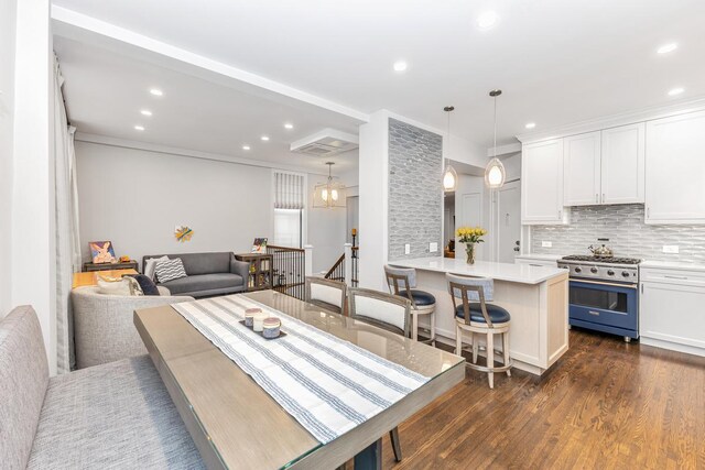 24 W 69th St Unit 9B, New York City, NY 10023 - interior space with crown molding, recessed lighting, and dark wood-style flooring