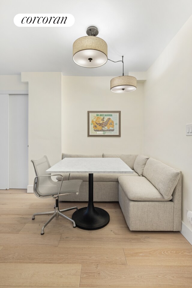 333 E 66th St Unit 5R, New York City, NY 10065 - dining room featuring wood finished floors and breakfast area