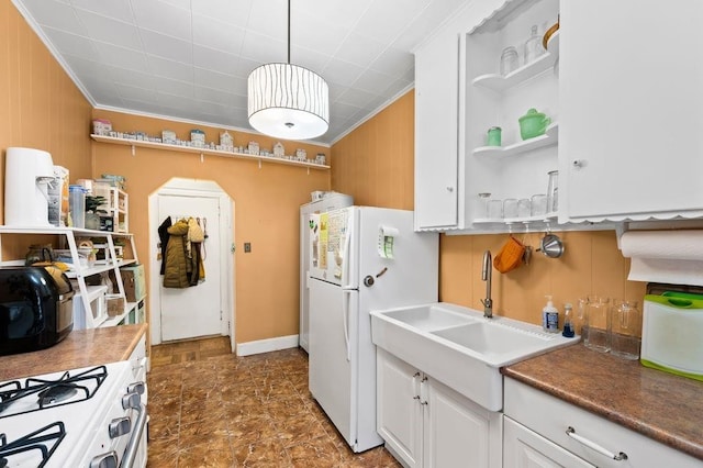 1741 73rd St, New York City, NY 11204 - kitchen featuring open shelves, freestanding refrigerator, white cabinetry, decorative light fixtures, and crown molding