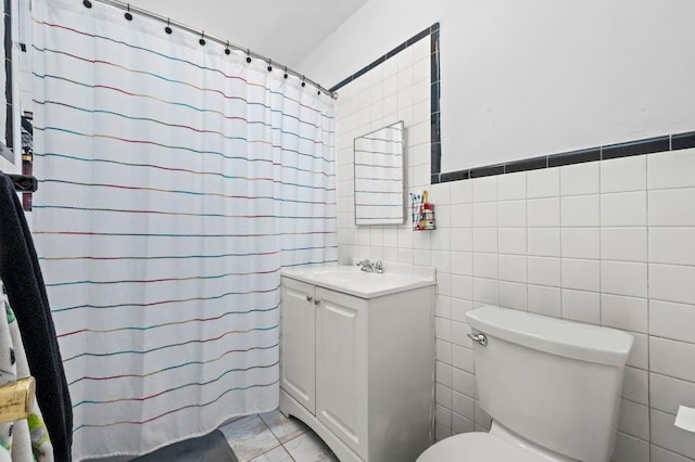 1741 73rd St, New York City, NY 11204 - bathroom featuring vanity, tile walls, marble finish floors, and curtained shower
