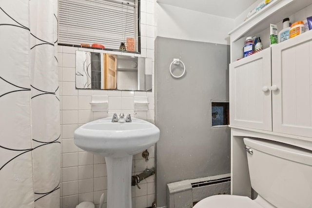 1741 73rd St, New York City, NY 11204 - bathroom featuring tile walls and baseboard heating