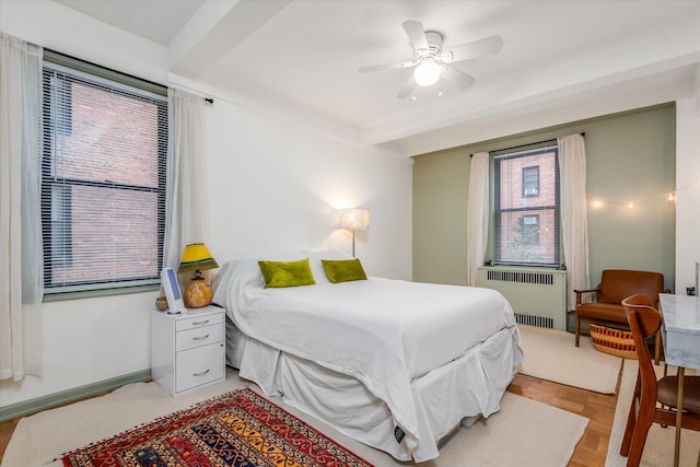 70 Park Ter W Unit E-23, New York City, NY 10034 - bedroom featuring radiator, a ceiling fan, and multiple windows