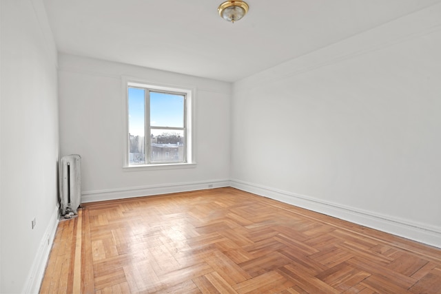 45-08 40th St Unit A42, New York City, NY 11104 - empty room featuring radiator and baseboards