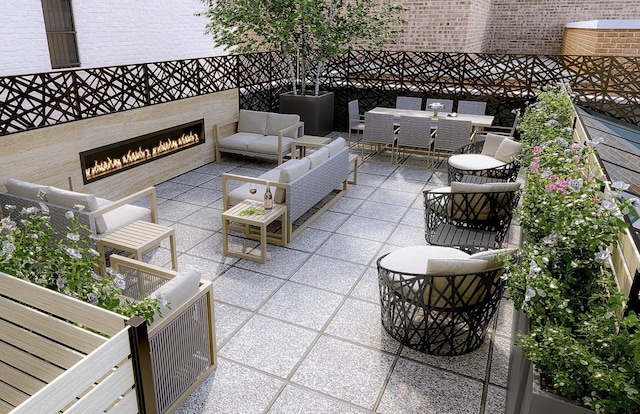 view of patio featuring outdoor dining area and an outdoor living space with a fireplace