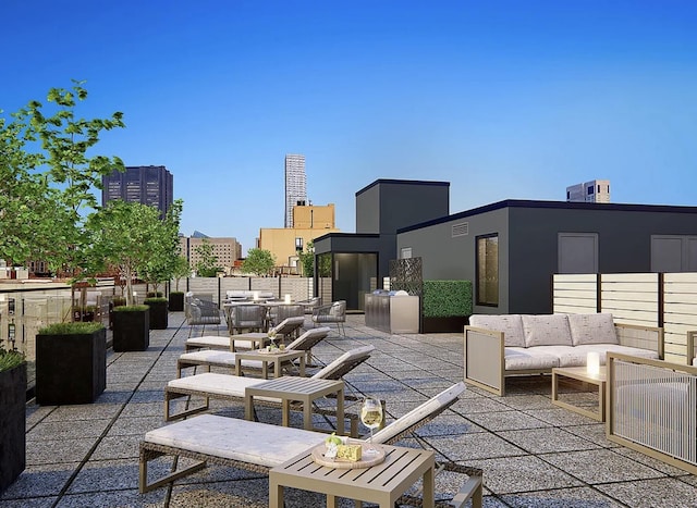 view of patio featuring a view of city and an outdoor living space