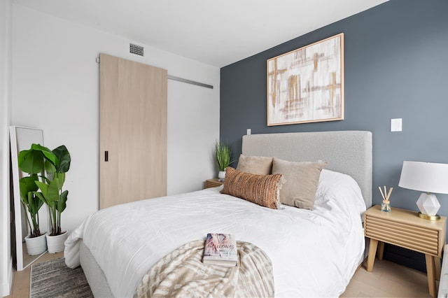 bedroom with visible vents