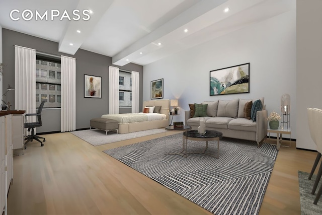 living room with light wood-type flooring and beamed ceiling