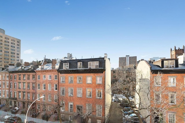 view of building exterior with a city view