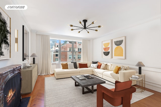 living room with parquet floors, a chandelier, and crown molding