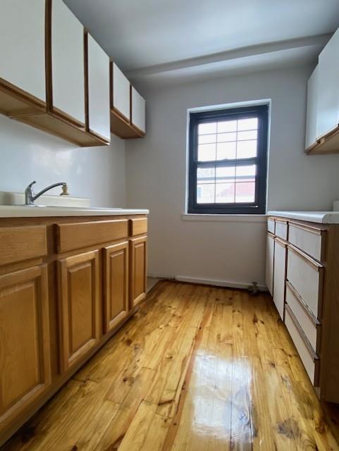 kitchen featuring sink and light hardwood / wood-style floors