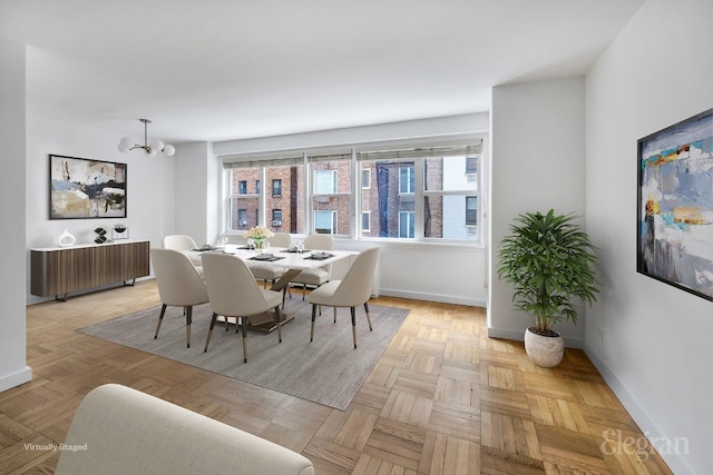 dining space featuring radiator and baseboards