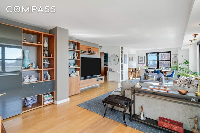 living area with light wood-style floors