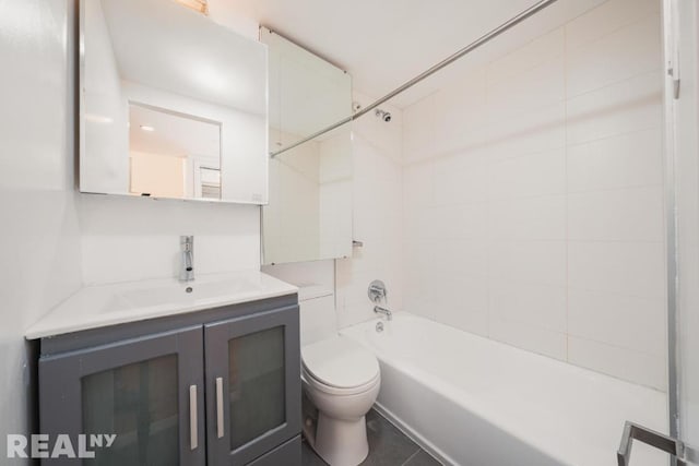 bathroom featuring  shower combination, vanity, and toilet