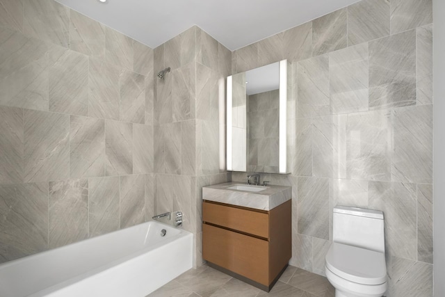 15 Hudson Yards Unit 38C, New York City, NY 10001 - full bathroom with tile walls, vanity, toilet, and washtub / shower combination